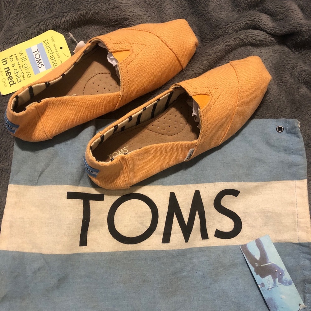 TOMS Orange Slip-On Shoes